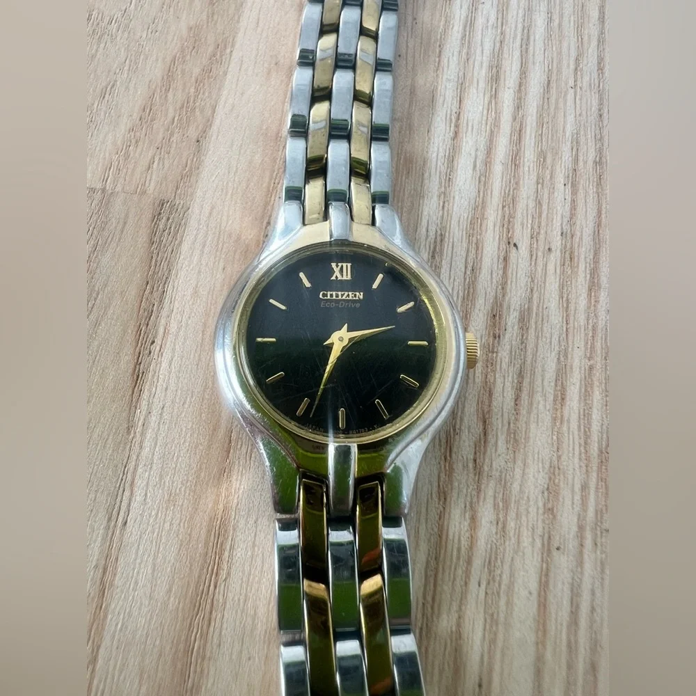 Citizen eco-drive ladies black dial two toned solar dress watch